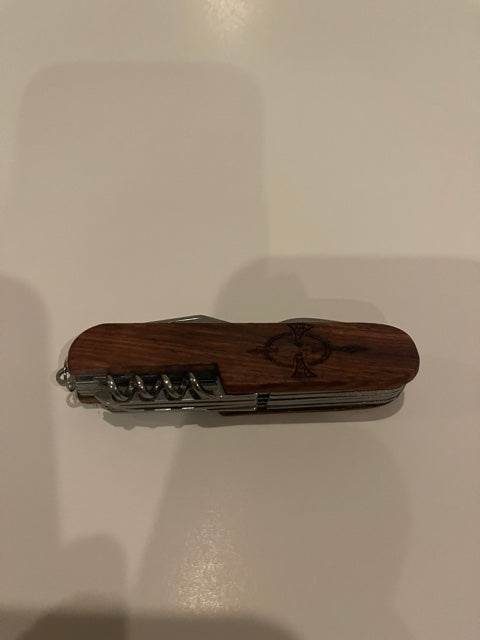 Multi tool pocket knife with custom engraving on wood handle